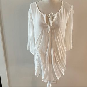 NWT Francesca’s cream tunic , bow detail back, size S/M,would be cute swim cover